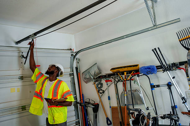 Professional Garage Door Panel Replacement technician working in Pisgah, AL
